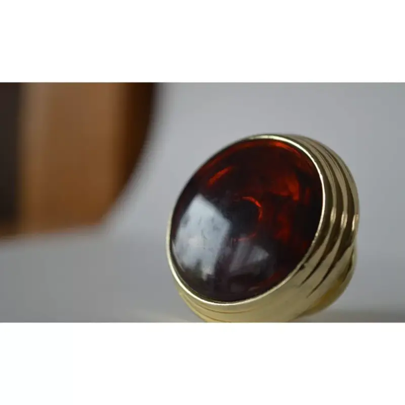Fém-műanyag bútorgomb, arany-mahagóni színű, 34 mm átmérő Végkiárusítás