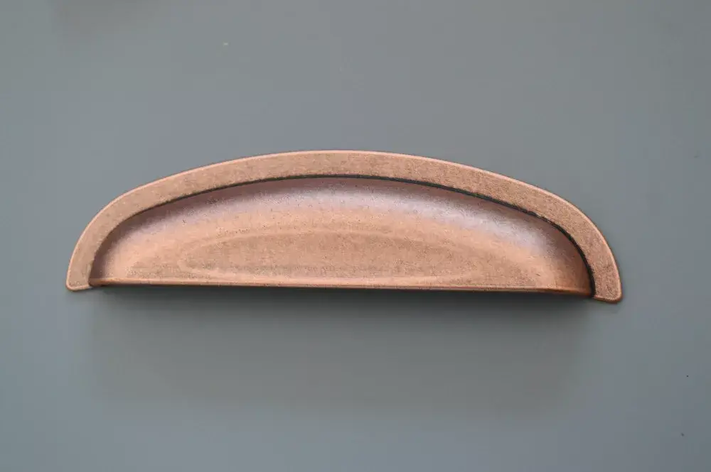 ARUBA fém bútorfogantyú, antik vörösréz színű, 128 mm furattávval Bestseller