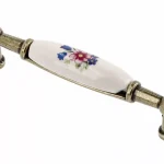 Kedvezmény Porcelán-fém bútorfogantyú, antik bronz-színes virággal, 96 mm furattávval