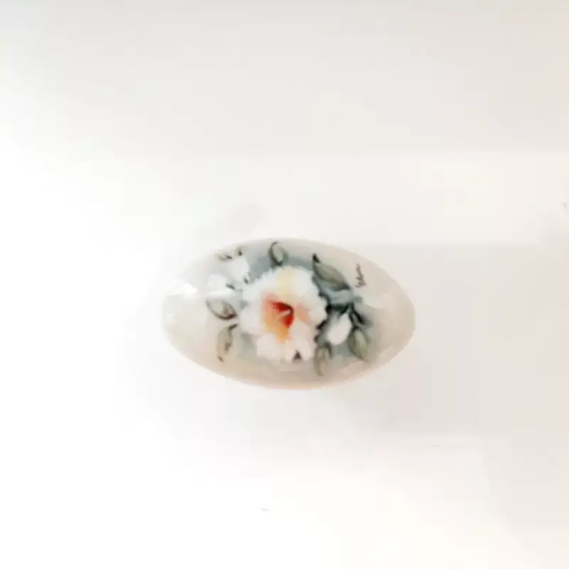 Elfenbeinfarbener Möbelknopf aus Porzellan mit Blumenmotiv Biztonságos fizetés