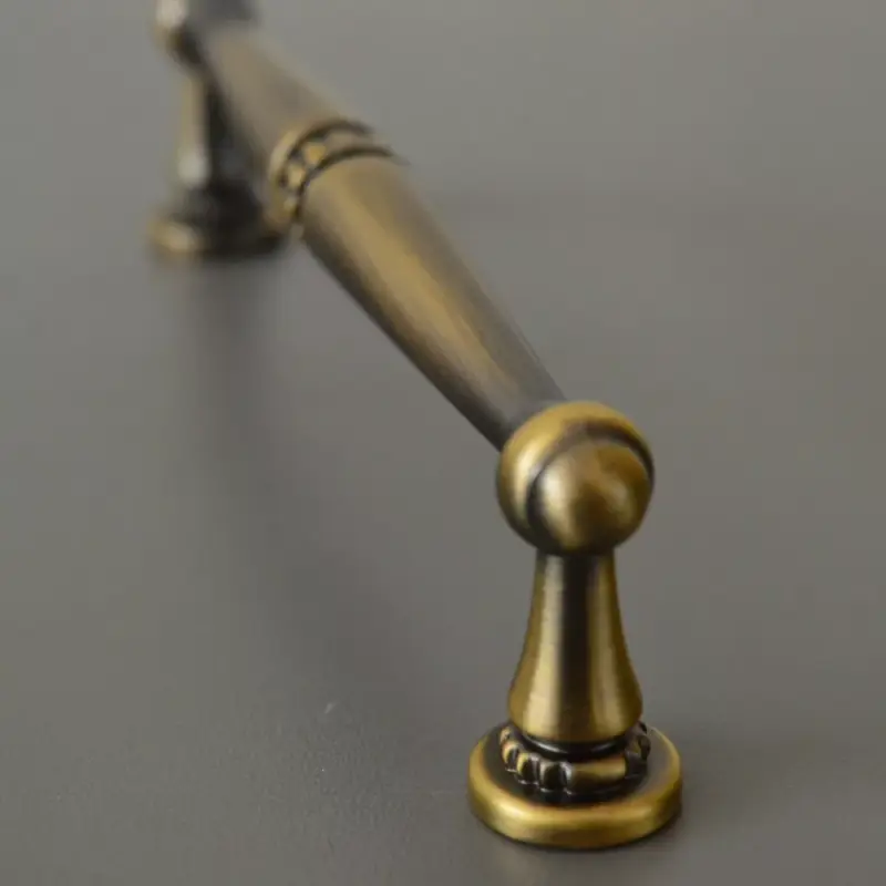 5263_160 -Antikupferbeschichteter Metall-Möbelgriff aus Messing, 160 mm Bohrung Árcsökkenés