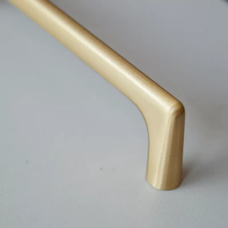 OCTAVIO Metallgriff, 128 mm Bohrung, gold gebürstet Legnépszerűbb